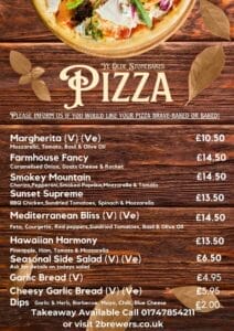 A menu titled "Ye Olde Stonebaked Pizza" lists various pizzas and their prices, including Margherita, Farmers Fancy, Smokey Mountain, and more. Additional items like Garlic Bread, Seasonal Side Salad, and dips are also included. Takeaway information is provided at the bottom of the menu.