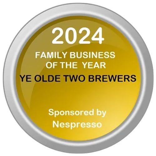 A gold and silver circular award badge reads: "2024 Family Business of the Year, Ye Olde Two Brewers. Sponsored by Nespresso.